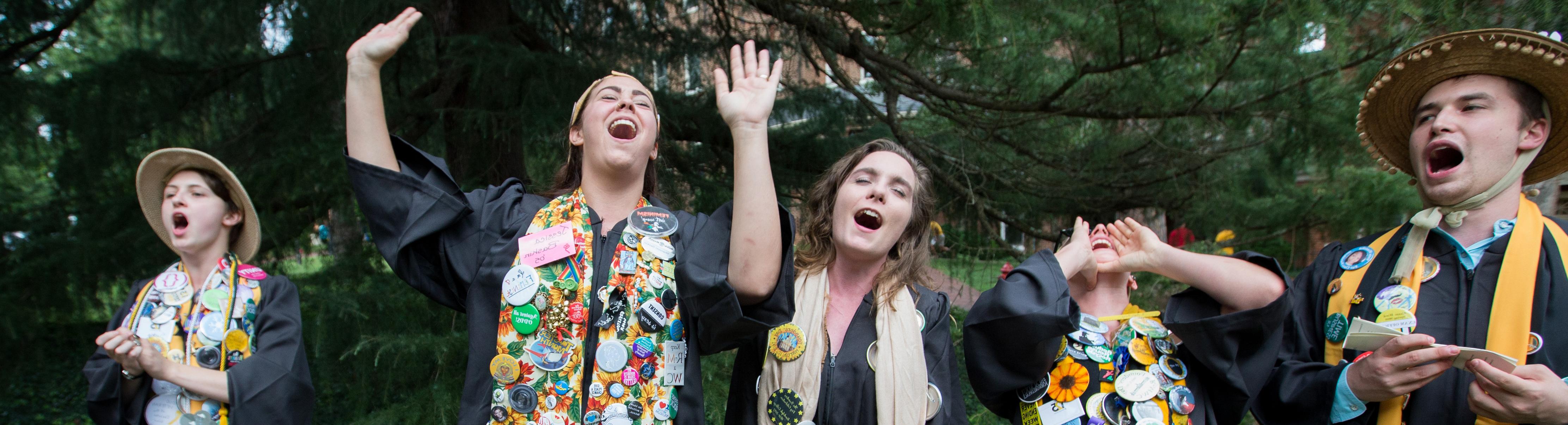 Students at a yearly event wearing buttons.